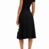 Short-Sleeved Midi Dress with Neckline and Daisies. Short-Sleeved Midi Dress with Neckline and Daisies.